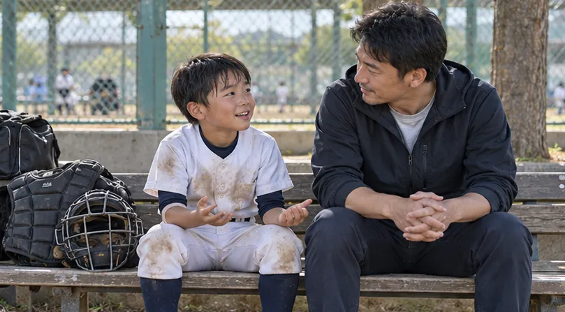 試合後、防具を外した少年捕手の話に、父親が穏やかに耳を傾ける場面(生成AIによるイメージ)